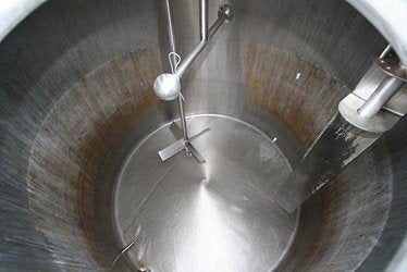 DCI Vertical Stainless Steel Steam Jacketed Process Tank with Agitator -1,500 Gallon DCI Inc. 