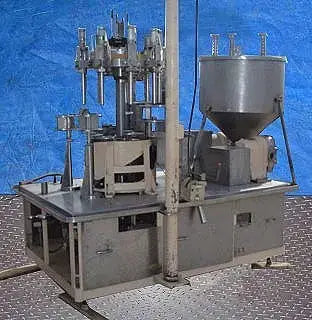 Cozzoli Machine Company MRM-Elgin 9-Head Rotary Pressure Filler