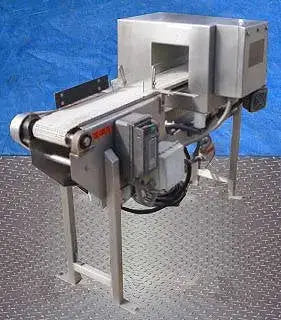 Detector de metales Loma Cintex con sistema transportador Goring Kerr