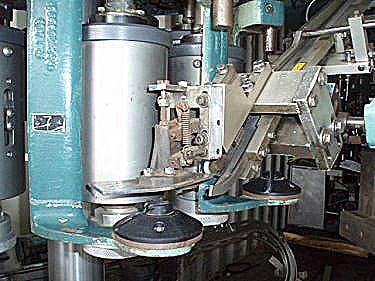 Pneumatic Scale Corporation 8-Head Capper with Rotating Cap Sorter Pneumatic Scale Corporation 
